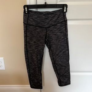 Athleta black and gray cropped leggings, size XS.